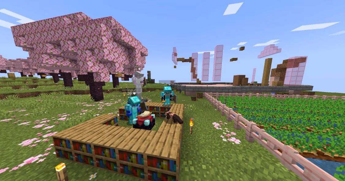 3 players at an enchantment table in the El Reto series